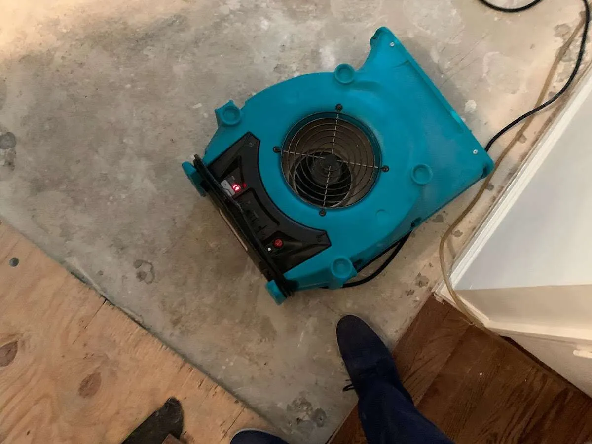 Air mover drying subfloor during Leak Detection & Repair in Florida City